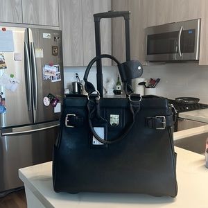 Hardly used Black Cabrelli Laptop Travel Roller Bag